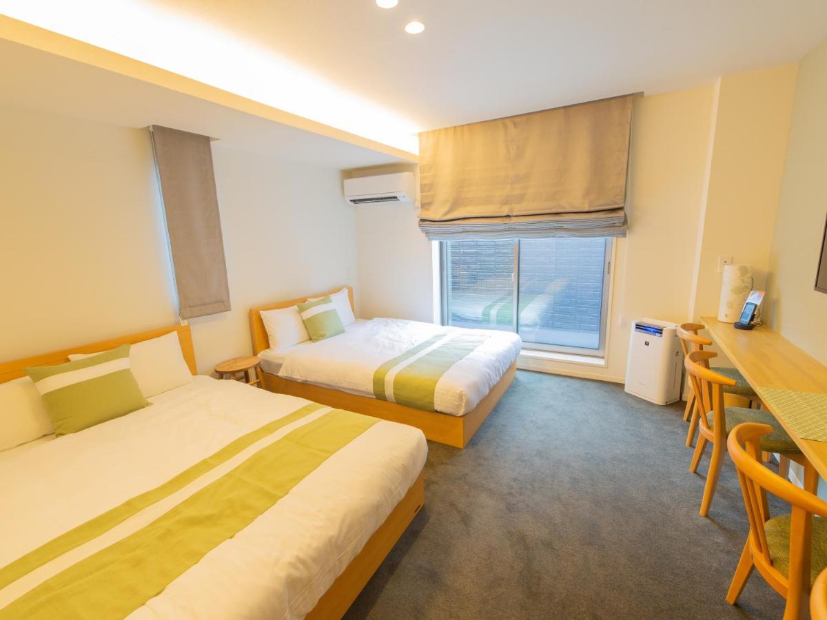 Grand Base Hiroshima Ekimae Aparthotel Exteriör bild