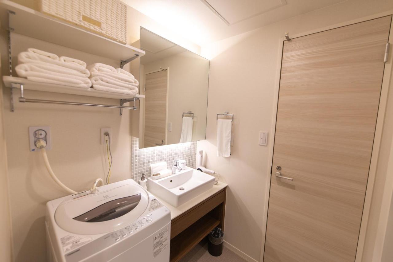 Grand Base Hiroshima Ekimae Aparthotel Exteriör bild