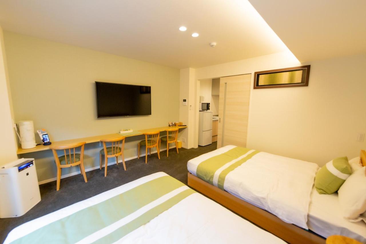 Grand Base Hiroshima Ekimae Aparthotel Exteriör bild